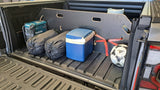 2nd Gen Amarok bed divider securing tools and cargo in the ute’s bed for organised storage.