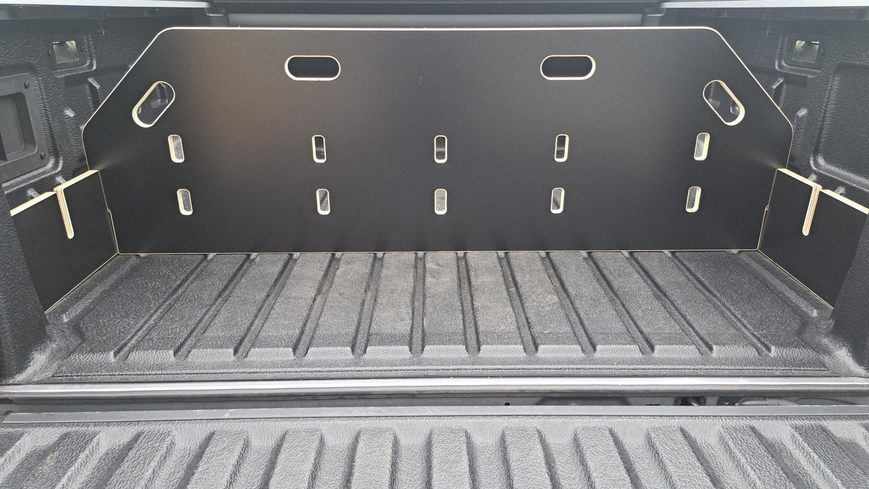 Durable tray divider for the 2nd Gen Amarok, ideal for separating gear in the ute bed.