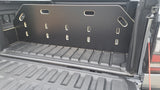 2nd Gen Amarok bed divider securing tools and cargo in the ute’s bed for organised storage.